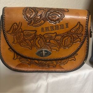 Brown leather saddle bag with flower  Design. Custom made for “Sherri”